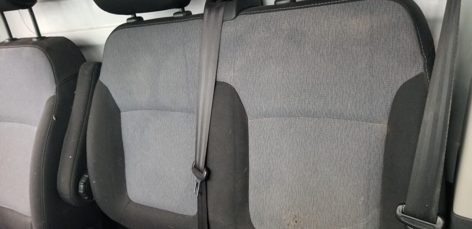 Close-up of Vauxhall Vivaro Mk2 seat upholstery and stitching