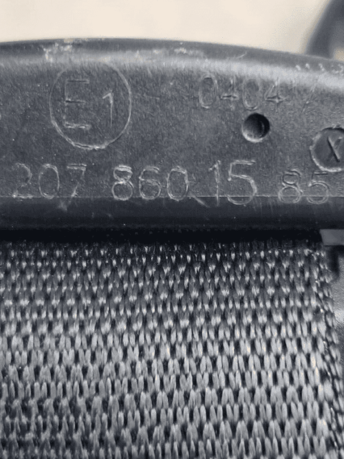 Label showing part number A2078601585 on seat belt assembly