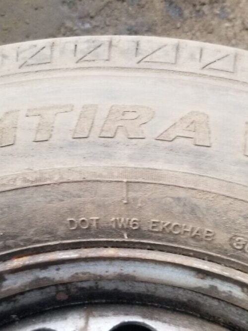 Side view of 16-inch steel wheel with tyre mounted