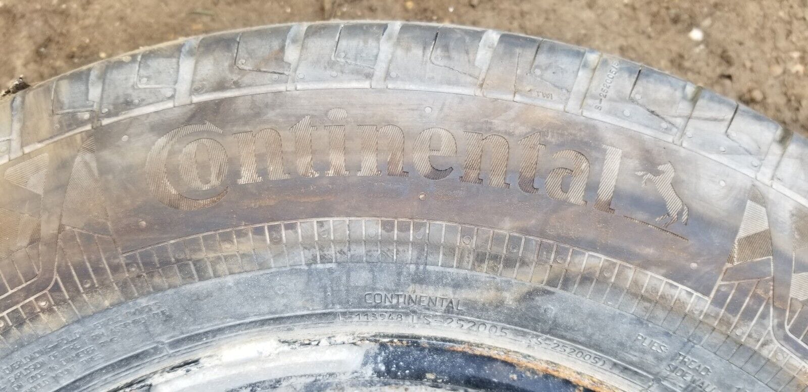 Close-up of 225/65R16C tyre brand name Continental