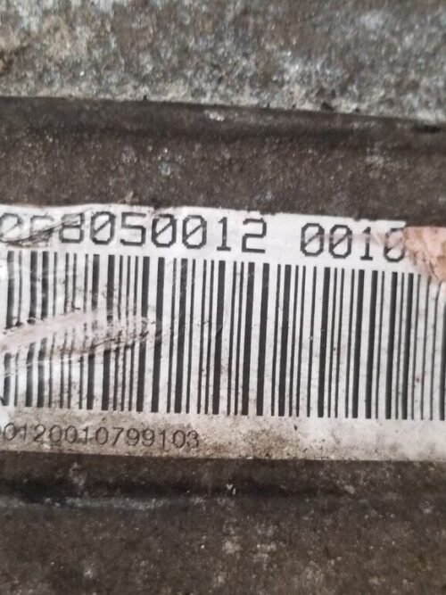 Label showing part number 1068050012 on X5 gearbox housing