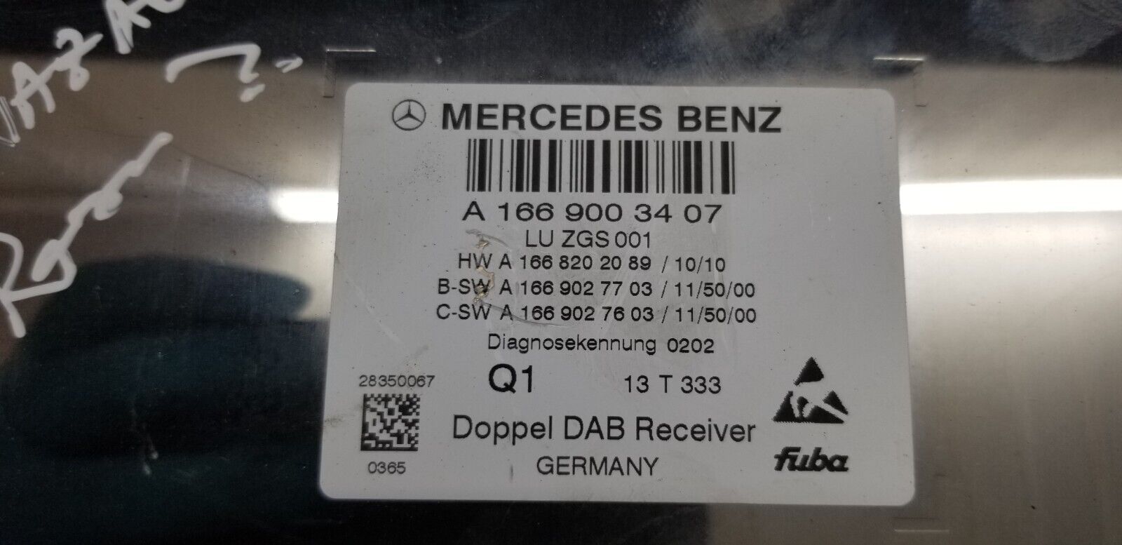 Close-up Mercedes E Class W212 DAB control ECU A1669003407 part number label